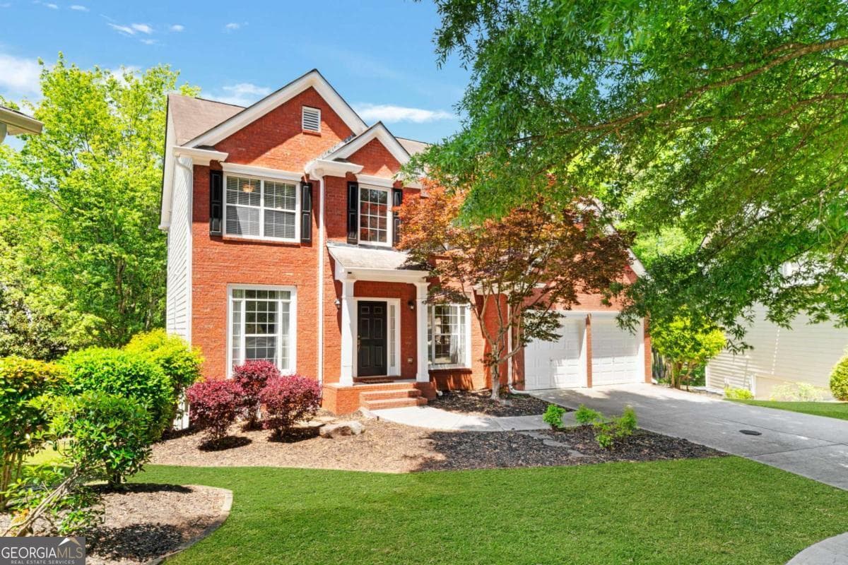 4 bedroom, 2.5 bathroom, 2,490 sq ft single family residence sold at 407 Whisper Wind Lane, Woodstock, GA 30188