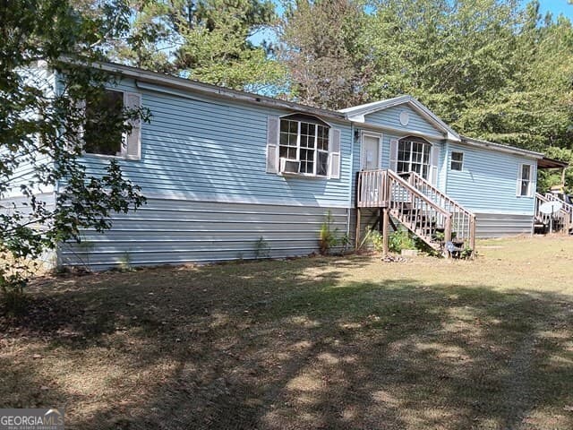 3 bedroom, 2 bathroom, 1,904 sq ft manufactured home,single family residence under contract at 176 Pineland Estates Road, Cochran, GA 31014