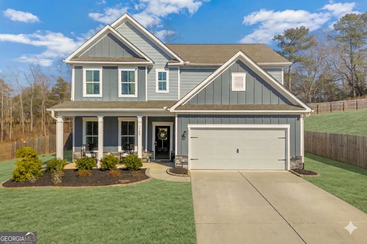 4 bedroom, 3 bathroom, 2,505 sq ft single family residence sold at 1729 Flagstone Lane, Conyers, GA 30012