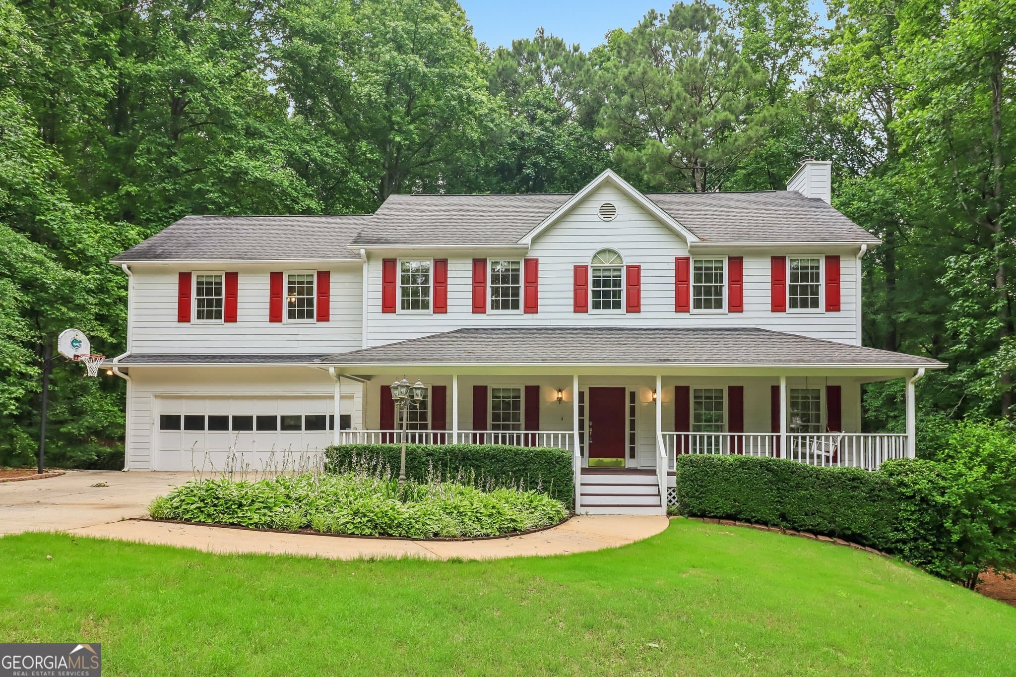 4 bedroom, 2.5 bathroom, 2,512 sq ft single family residence sold at 8215 Stonebrook Court, Cumming, GA 30040