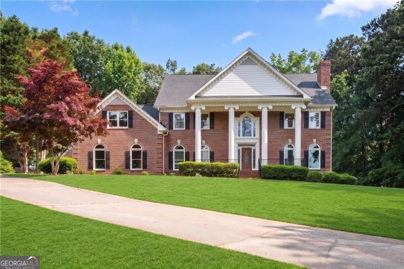 6 bedroom, 5.5 bathroom, 6,337 sq ft single family residence sold at 1889 E Gate Drive, Smoke Rise, GA 30087