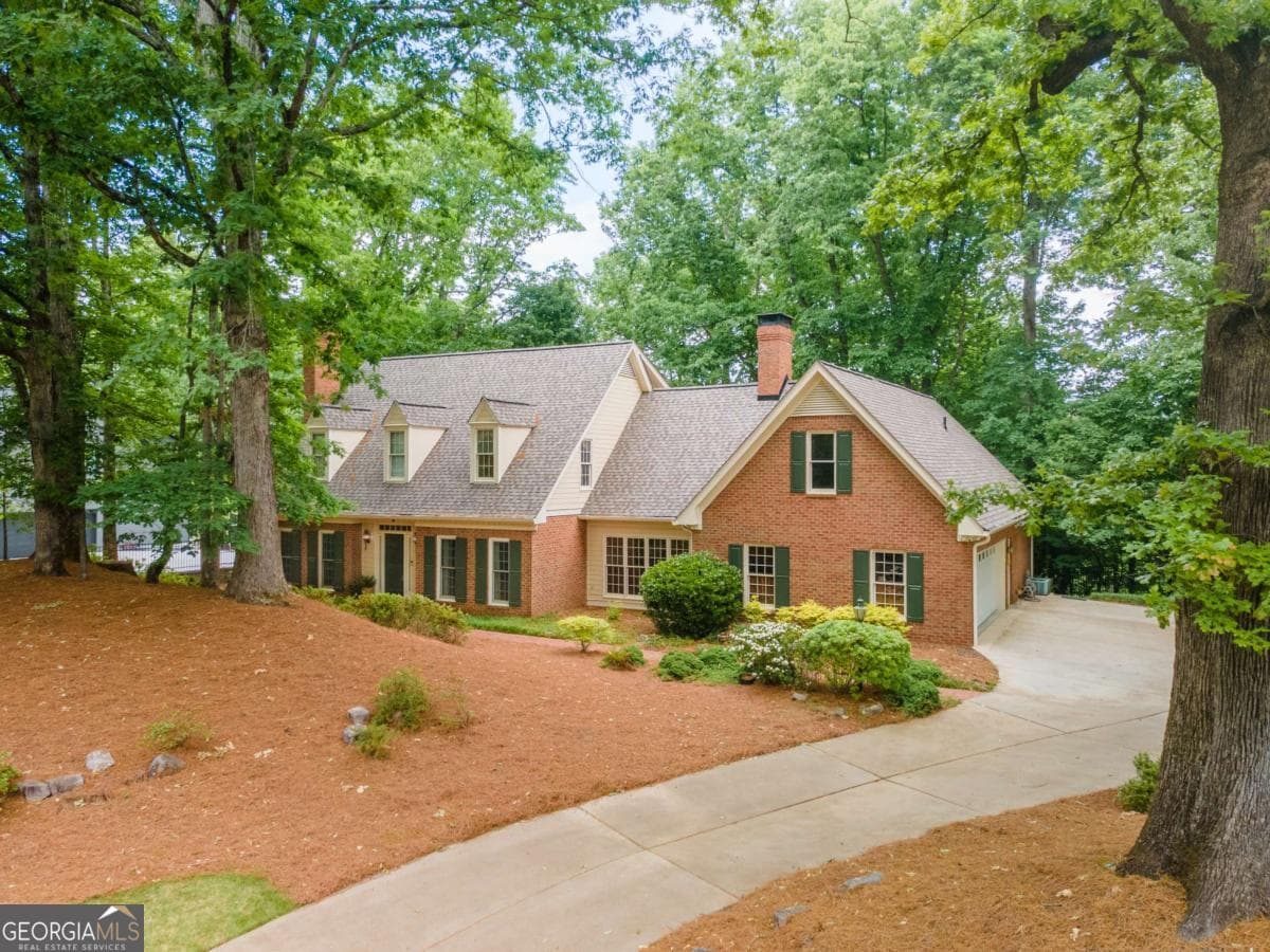 5 bedroom, 5 bathroom, 5,646 sq ft single family residence sold at 335 Cameron Ridge Drive, Atlanta, GA 30328