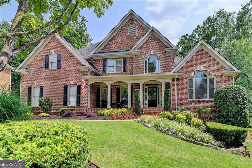 5 bedroom, 4.5 bathroom single family residence sold at 4325 Woodward Way, Cumming, GA 30041