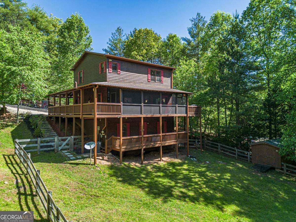 3 bedroom, 3 bathroom, 2,292 sq ft cabin,single family residence sold at 392 Oak Hills Drive, Morganton, GA 30560