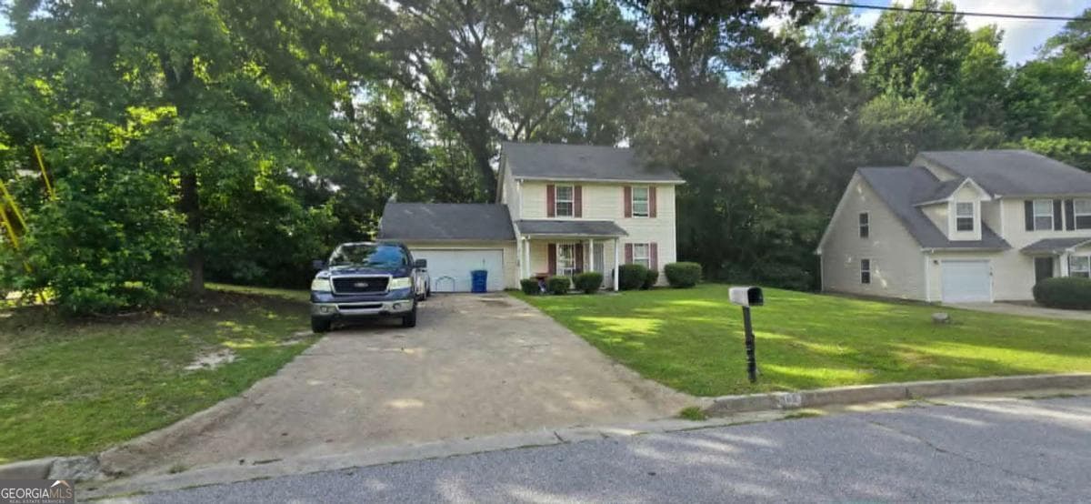 4 bedroom, 3 bathroom, 1,500 sq ft single family residence for sale at 865 Old Rocky Road, Atlanta, GA 30349