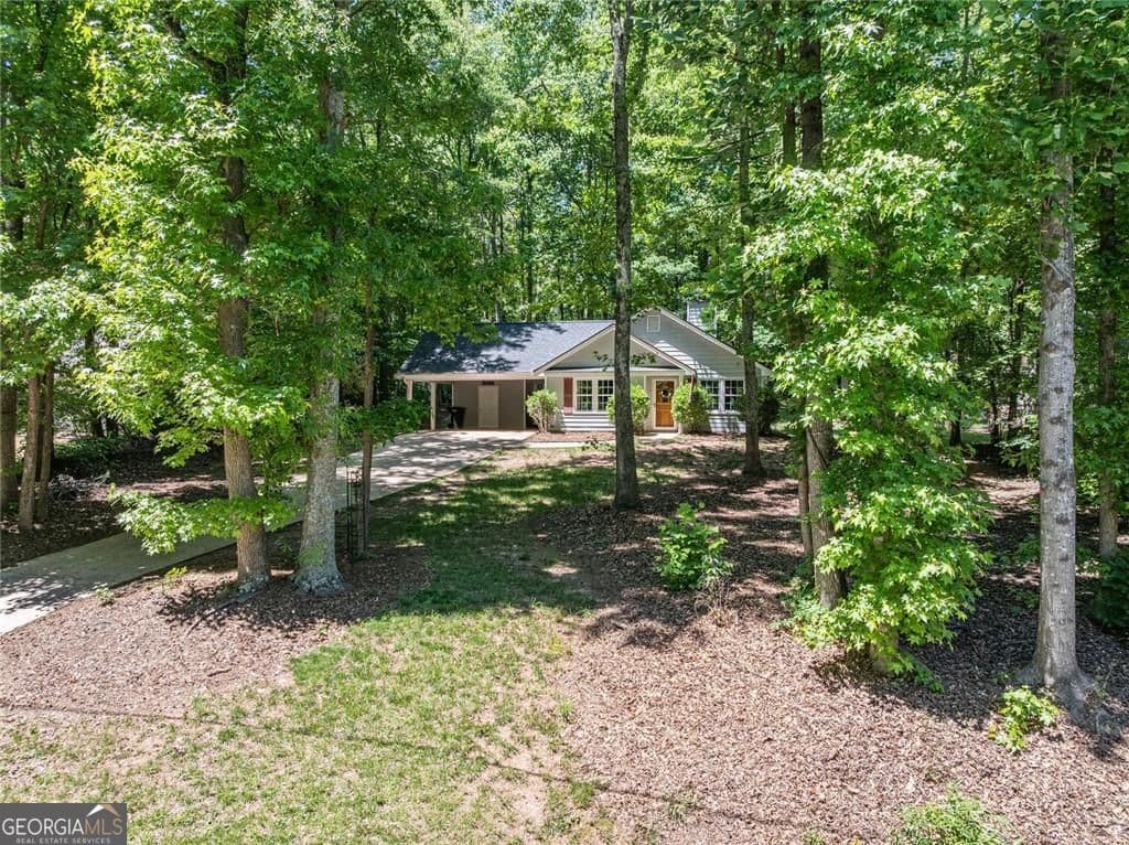 3 bedroom, 2 bathroom, 1,342 sq ft single family residence sold at 3430 Lakeside Lane, Cumming, GA 30040