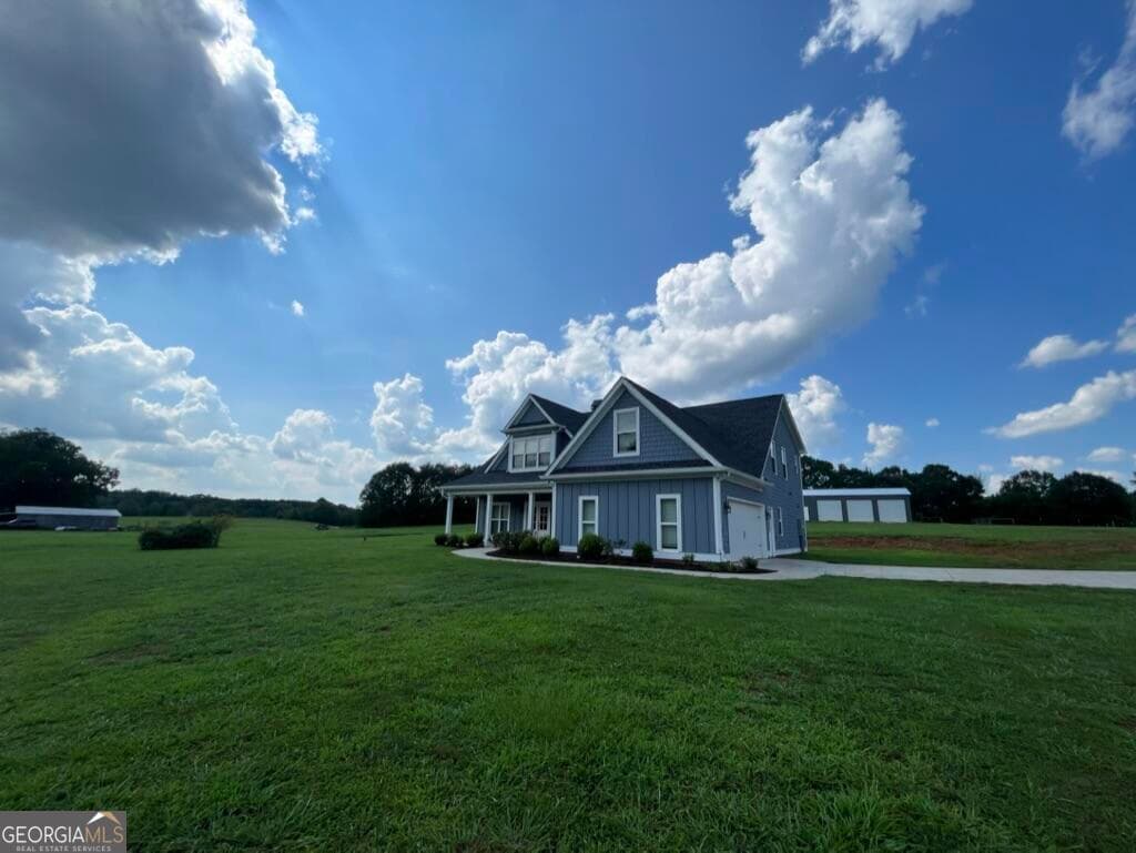 4 bedroom, 3.5 bathroom, 3,548 sq ft single family residence sold at 999 Snip Dillard Road, Monroe, GA 30656
