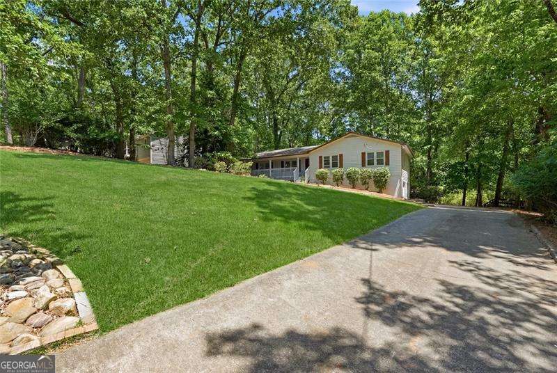 4 bedroom, 2 bathroom, 2,204 sq ft single family residence sold at 408 Riverlake Court, Woodstock, GA 30188