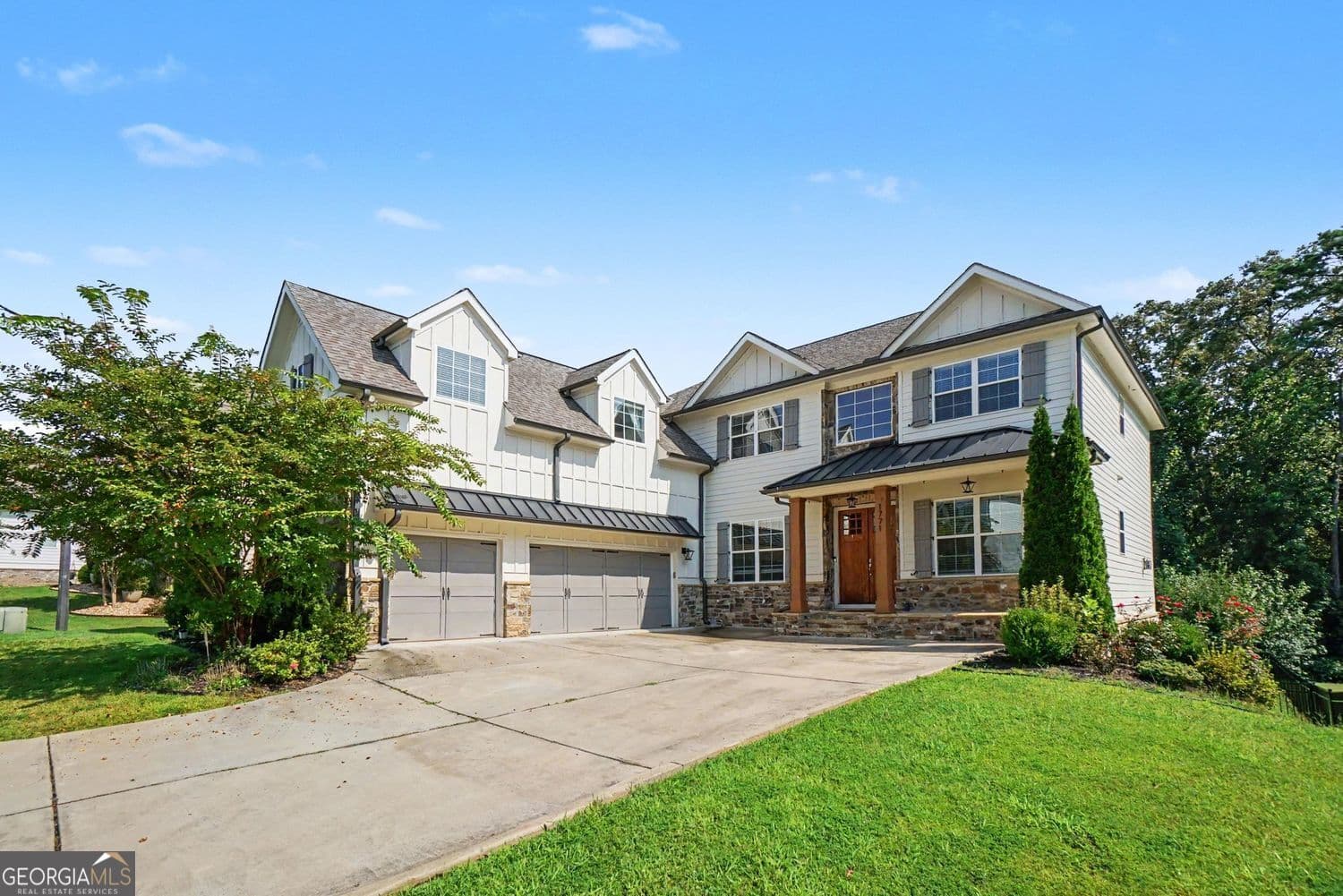 6 bedroom, 6 bathroom, 6,134 sq ft single family residence sold at 1771 Rockwater Road, Marietta, GA 30066