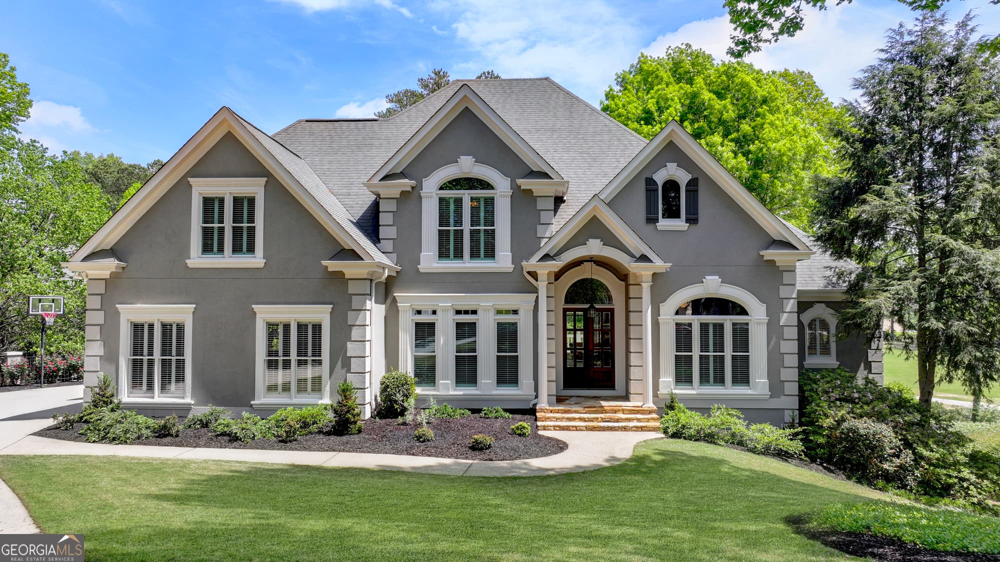 6 bedroom, 5 bathroom, 6,343 sq ft single family residence sold at 8130 Royal Troon Trace, Duluth, GA 30097