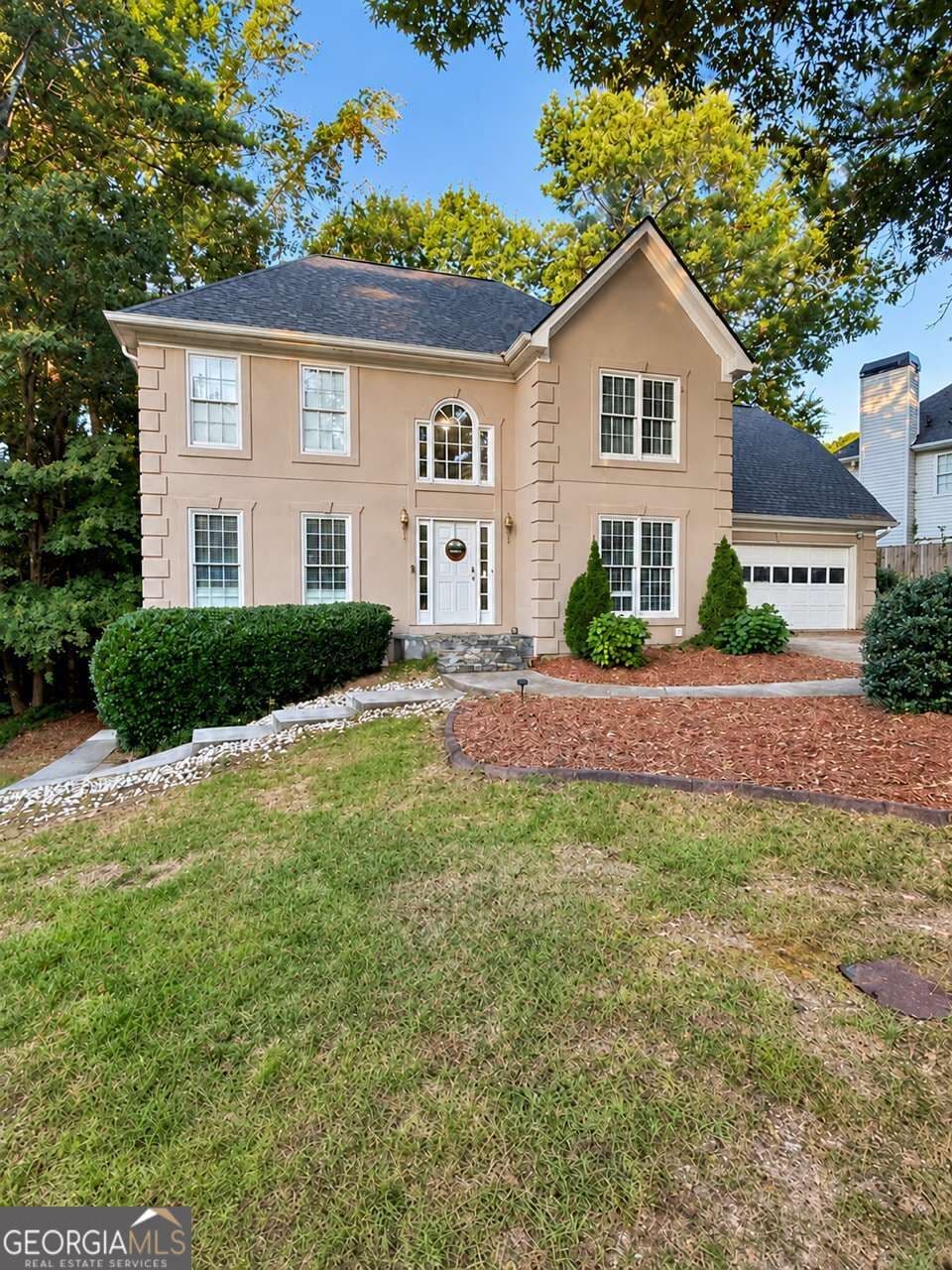 4 bedroom, 2.5 bathroom, 3,087 sq ft single family residence for sale at 1219 Lochshyre Court, Lawrenceville, GA 30043