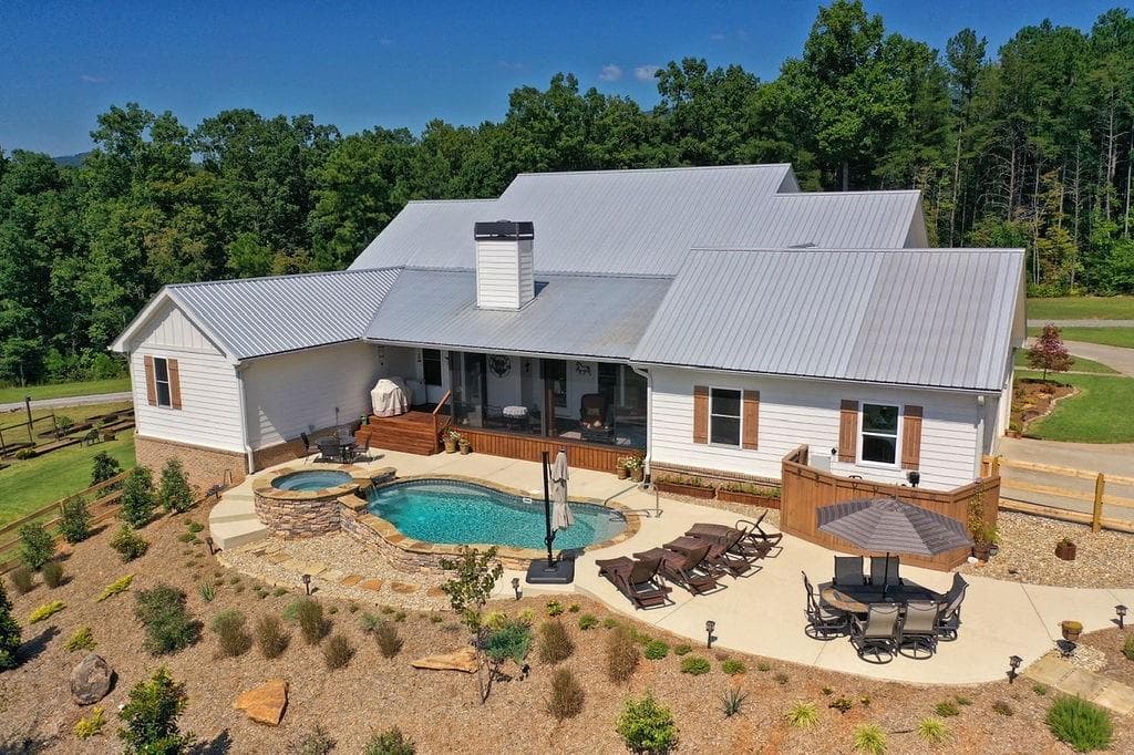6 bedroom, 5 bathroom single family residence sold at 5585 Cove Road, Jasper, GA 30143