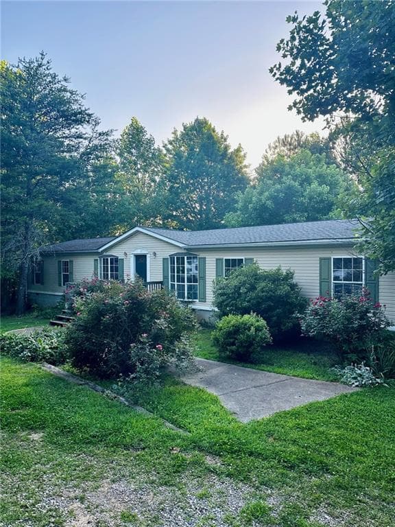 4 bedroom, 2 bathroom, 2,052 sq ft single family residence sold at 1705 Land Road, Canton, GA 30114