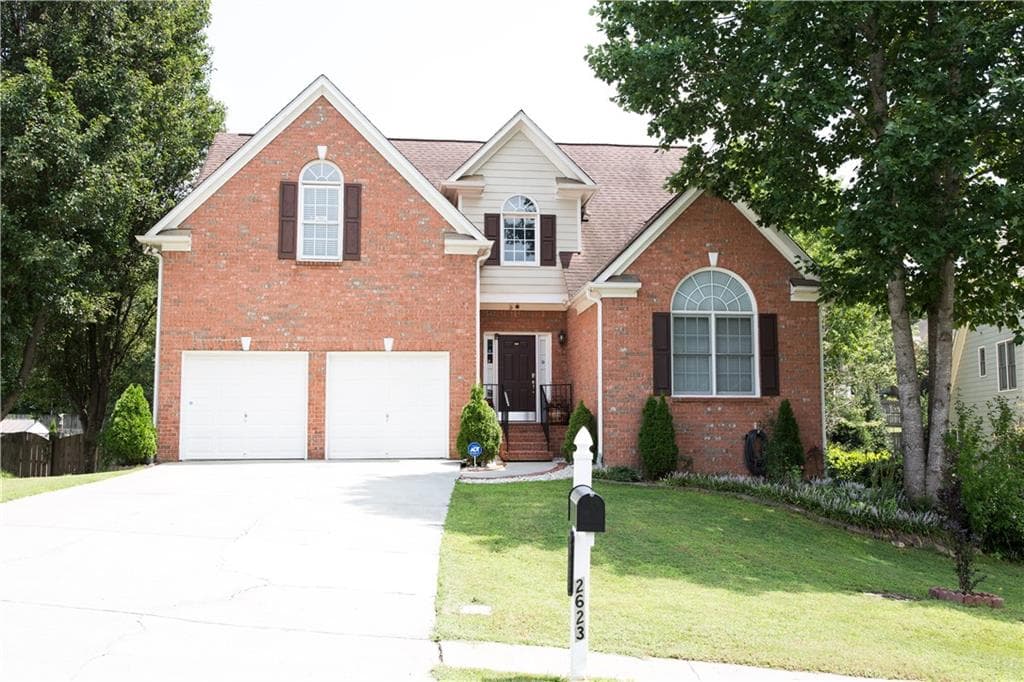 6 bedroom, 4 bathroom single family residence sold at 2623 Silver Dust Drive, Buford, GA 30519
