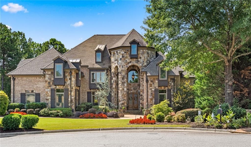 5 bedroom, 7 bathroom, 9,767 sq ft single family residence sold at 529 Gold Shore Lane, Canton, GA 30114