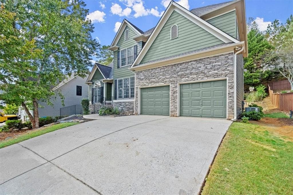 5 bedroom, 4 bathroom single family residence sold at 129 Gold Mill Place, Canton, GA 30114