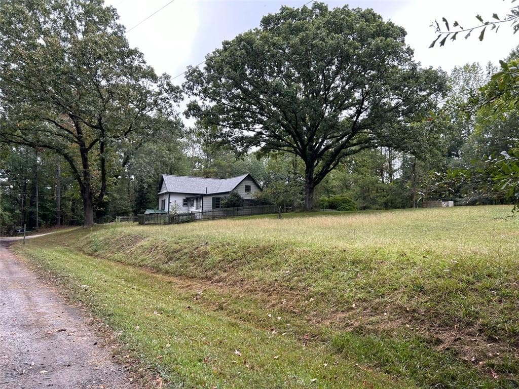 3 bedroom, 1 bathroom single family residence sold at 14160 COGBURN Road, Milton, GA 30004