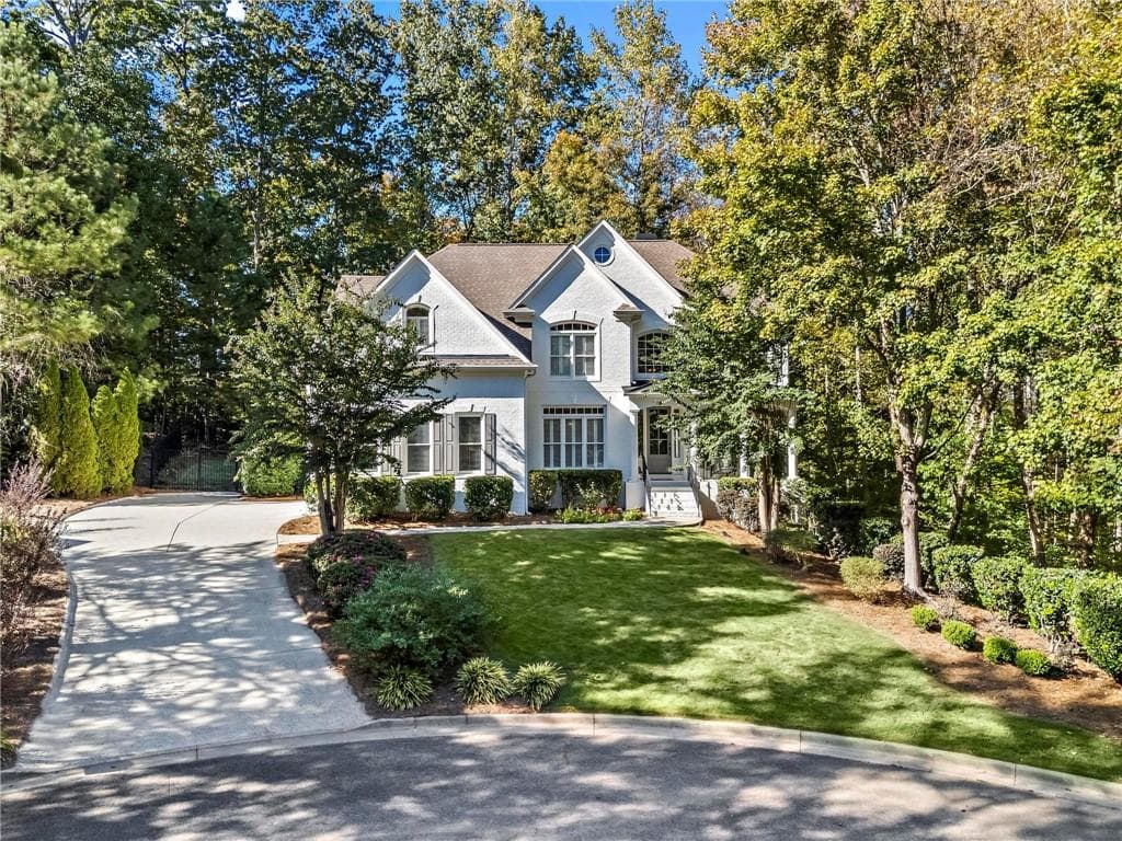 6 bedroom, 5 bathroom, 5,209 sq ft single family residence sold at 939 Ravenwood Way, Canton, GA 30115