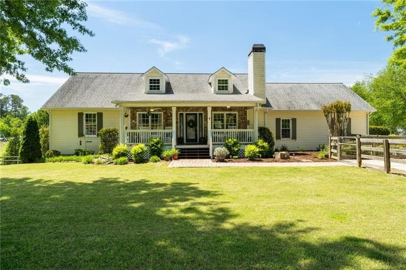 4 bedroom, 3 bathroom, 3,328 sq ft single family residence sold at 7945 Wallace Tatum Road, Cumming, GA 30028