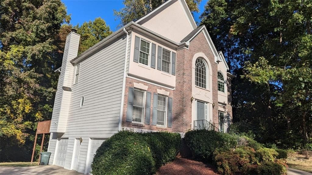 4 bedroom, 3 bathroom single family residence sold at 980 Laurel Springs Lane, Marietta, GA 30064