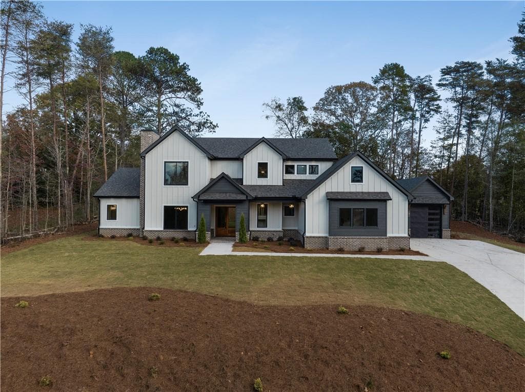 4 bedroom, 5 bathroom, 3,642 sq ft single family residence sold at 6029 BLUEWATER Boulevard, Gainesville, GA 30506