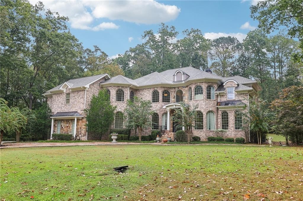 5 bedroom, 6 bathroom single family residence sold at 365 Tournament Players Drive, Milton, GA 30004