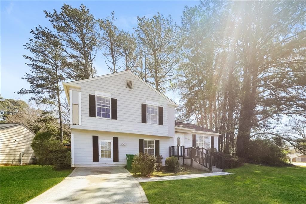 5 bedroom, 2 bathroom single family residence sold at 1226 Harvest Dale Court, Stone Mountain, GA 30088