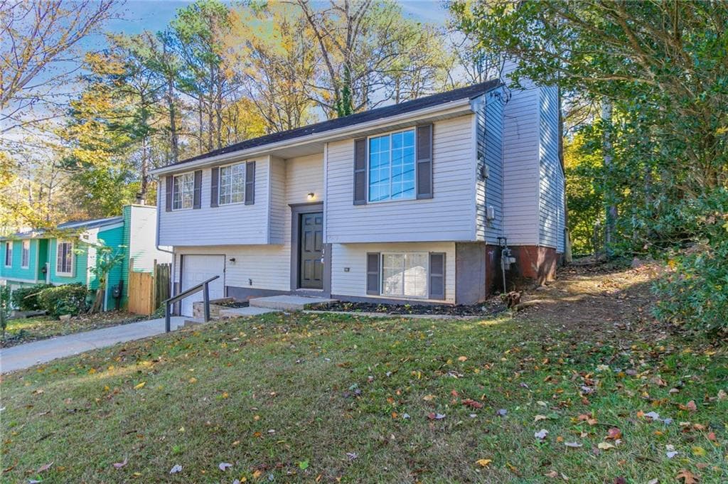 3 bedroom, 2 bathroom single family residence sold at 2076 Scarbrough Drive, Stone Mountain, GA 30088