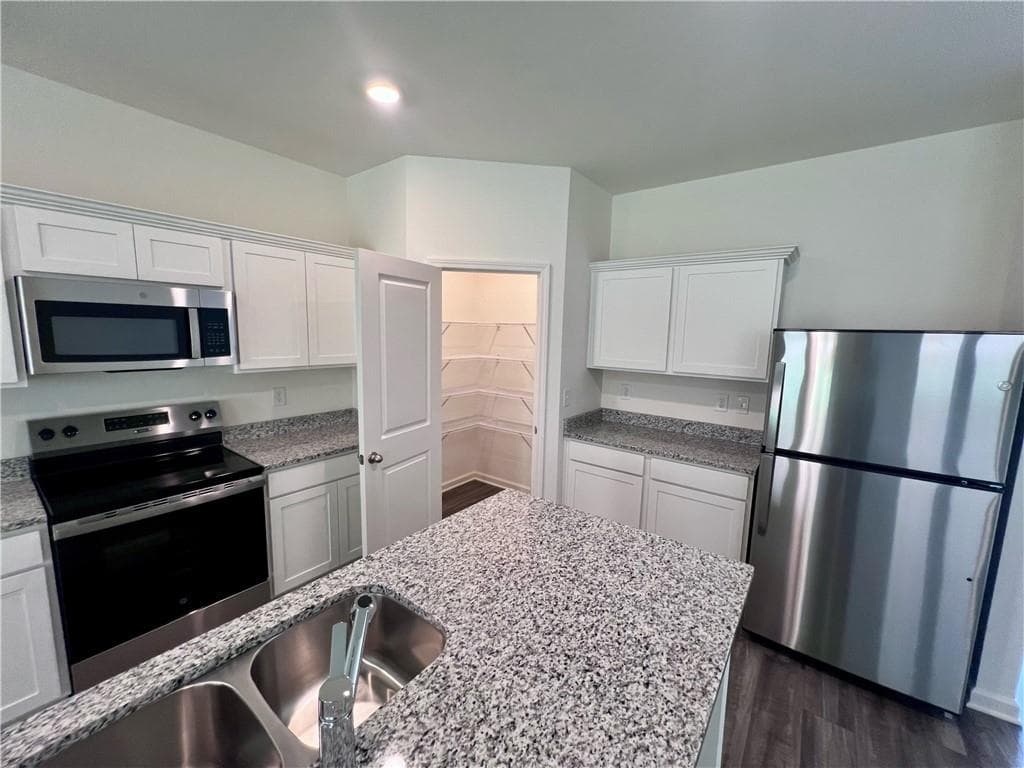 5 bedroom, 3 bathroom single family residence sold at 7542 Saffron Avenue, Covington, GA 30014