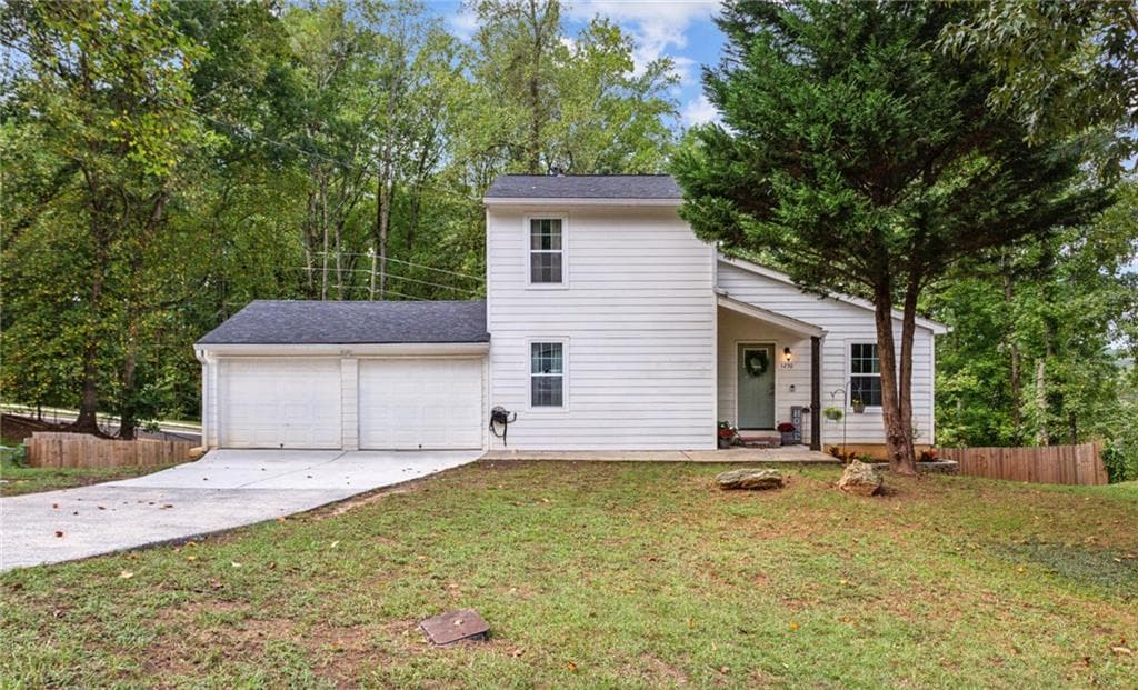 4 bedroom, 4 bathroom, 2,304 sq ft single family residence sold at 1250 Woodleigh Road, Marietta, GA 30008