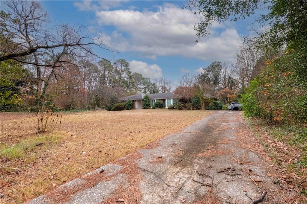 4 bedroom, 3 bathroom single family residence sold at 750 Mount Vernon Highway, Atlanta, GA 30327