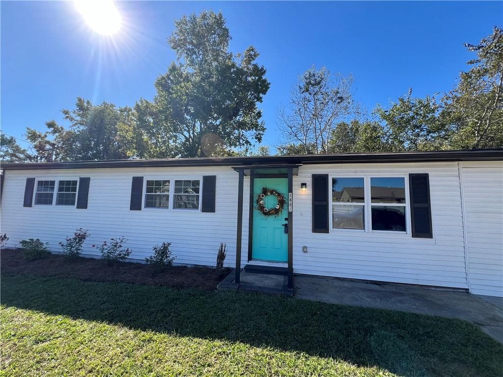 4 bedroom, 2 bathroom single family residence sold at 1015 Maxham Road, Austell, GA 30168