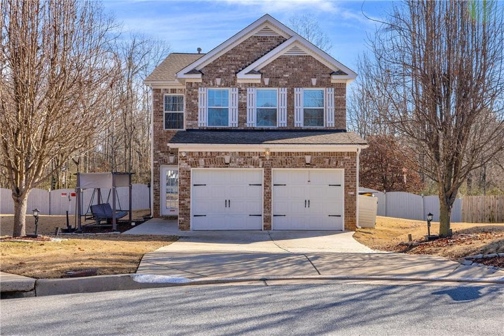 4 bedroom, 3 bathroom, 2,000 sq ft single family residence sold at 5735 Hedge Brook Drive, Cumming, GA 30028