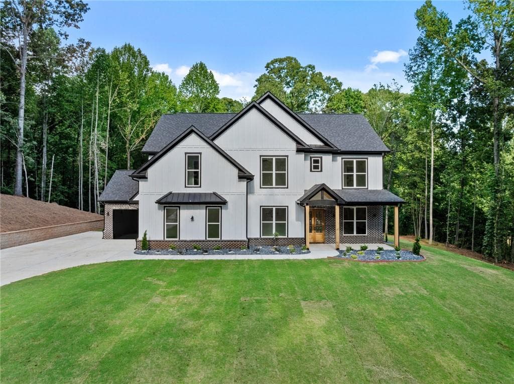 5 bedroom, 4 bathroom, 4,537 sq ft single family residence sold at 1144 Lexington Ridge Road, Hoschton, GA 30548