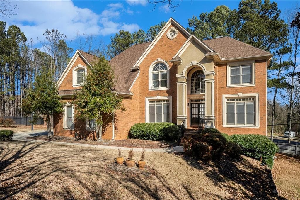 7 bedroom, 5 bathroom, 6,100 sq ft single family residence sold at 585 Stoneglen Chase, Atlanta, GA 30331