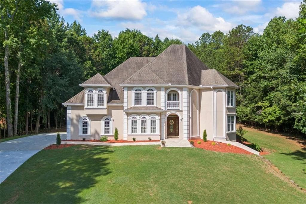 6 bedroom, 6 bathroom single family residence sold at 1052 Antrim Glen Drive, Hoschton, GA 30548