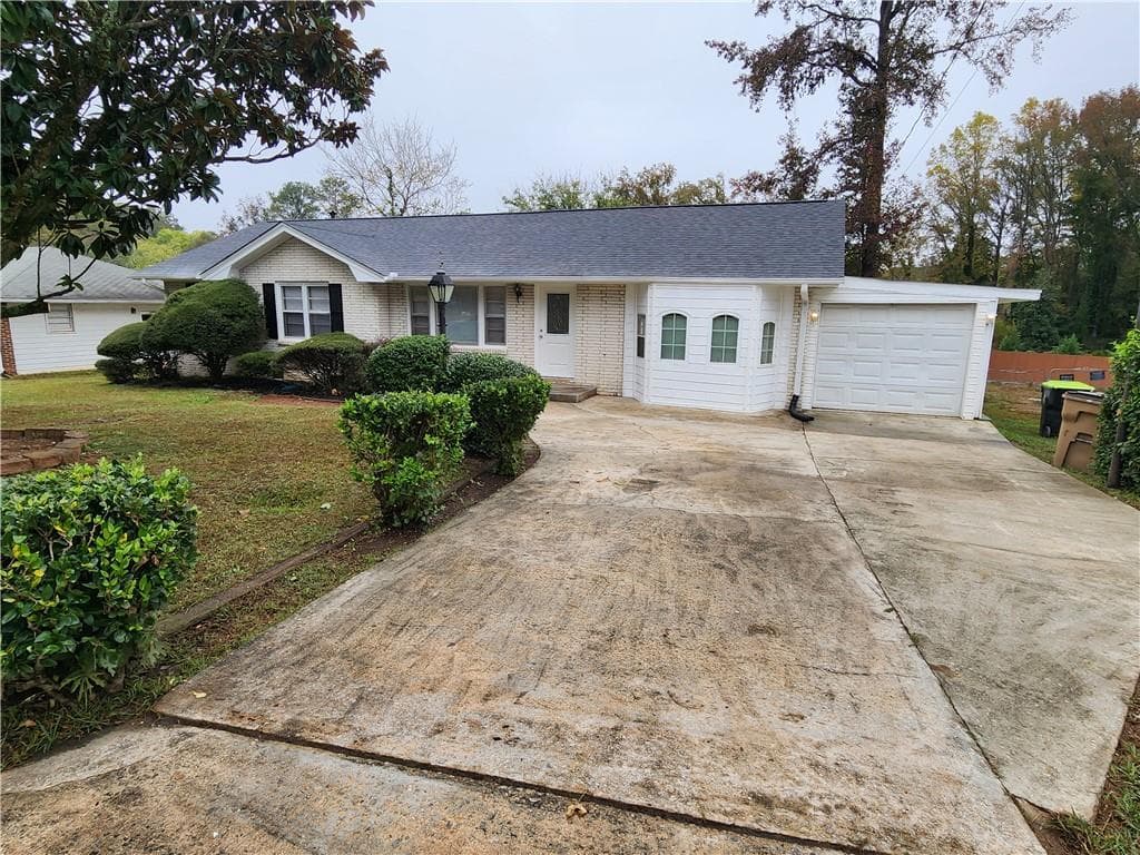 4 bedroom, 3 bathroom single family residence sold at 2614 Lilac Drive, Morrow, GA 30260