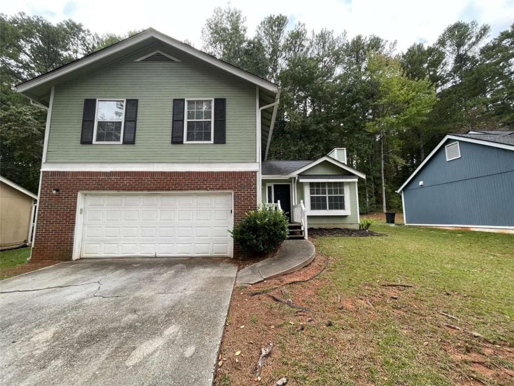 3 bedroom, 2 bathroom single family residence sold at 1937 Marbut Forest Drive, Lithonia, GA 30058