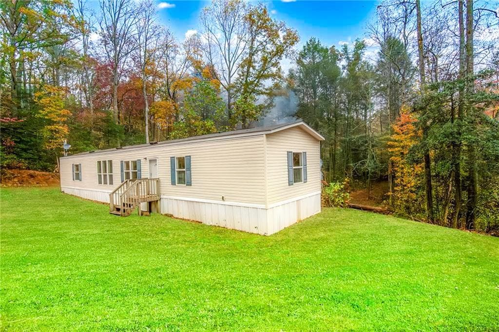 3 bedroom, 2 bathroom single family residence sold at 56 Almond Circle, Ellijay, GA 30540