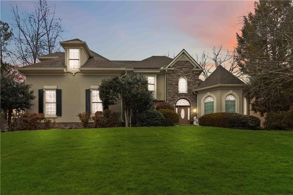 7 bedroom, 7 bathroom, 6,002 sq ft single family residence sold at 215 Stoney Ridge Drive, Alpharetta, GA 30022