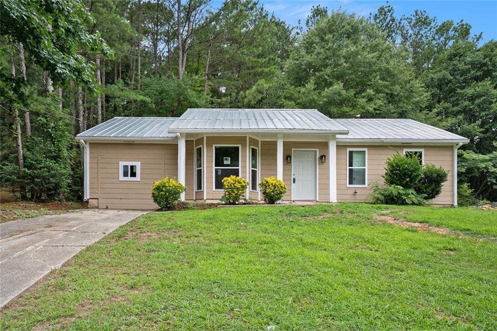 3 bedroom, 2 bathroom single family residence sold at 6945 Brown Drive, Fairburn, GA 30213