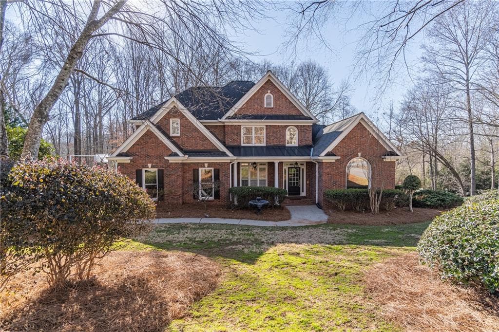 5 bedroom, 6 bathroom single family residence sold at 2055 Woods River Lane, Duluth, GA 30097