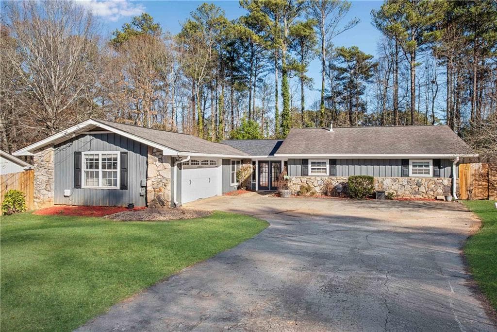 4 bedroom, 2 bathroom single family residence sold at 4037 Plantation Drive, Marietta, GA 30062