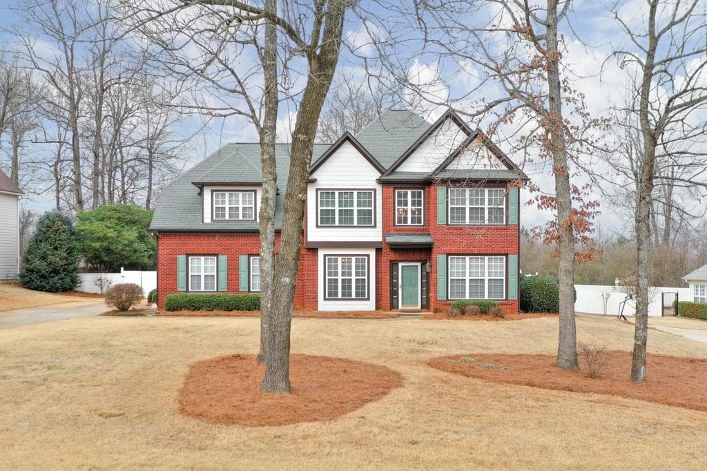 5 bedroom, 3 bathroom single family residence sold at 5016 Weatherstone Drive, Buford, GA 30519