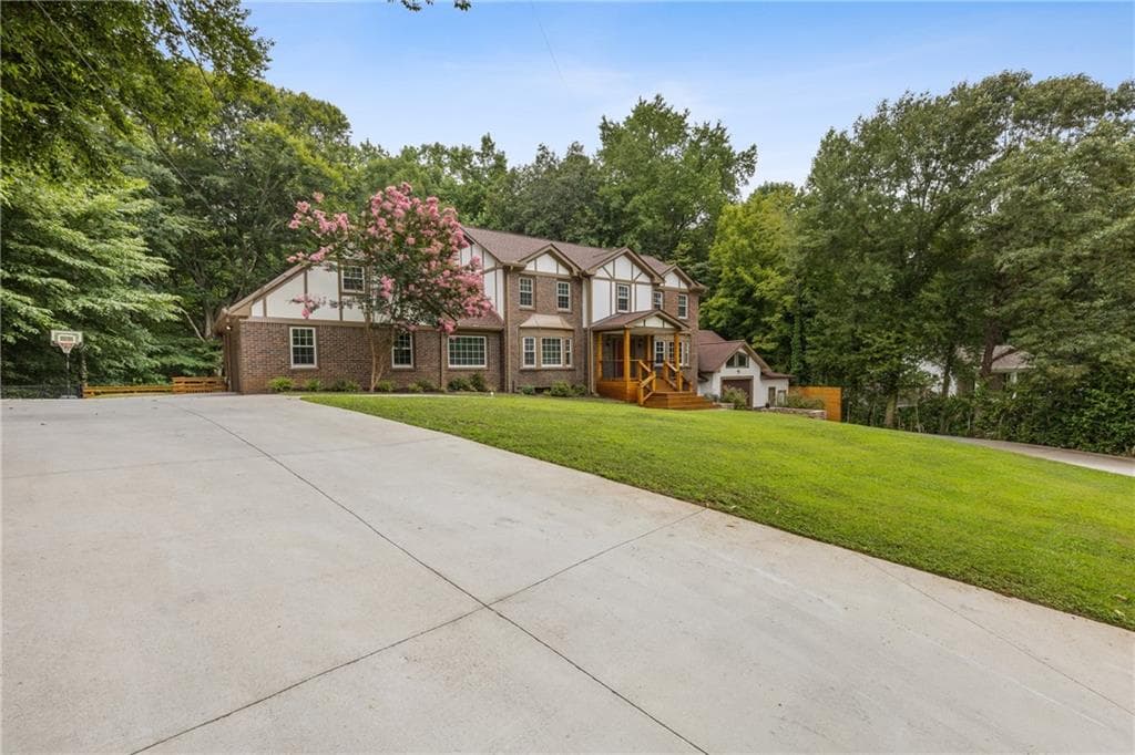 6 bedroom, 4 bathroom, 5,882 sq ft single family residence sold at 3996 Spalding Lane, Atlanta, GA 30350