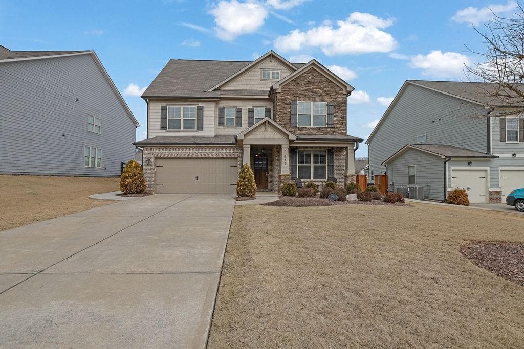 5 bedroom, 4 bathroom single family residence sold at 521 Flyingbolt Run, Canton, GA 30115