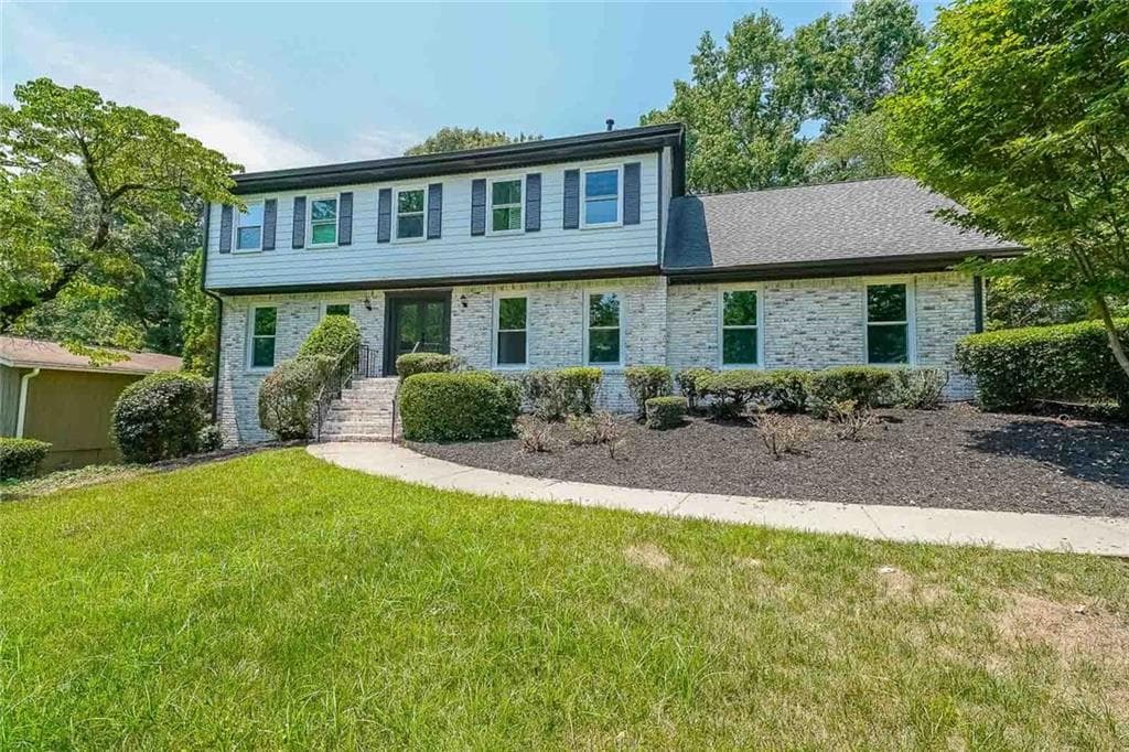 6 bedroom, 4 bathroom single family residence sold at 7602 Auden Trail, Atlanta, GA 30350