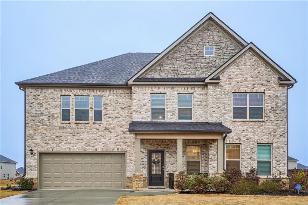 5 bedroom, 4 bathroom single family residence sold at 938 Blue Juniper Circle, Loganville, GA 30052