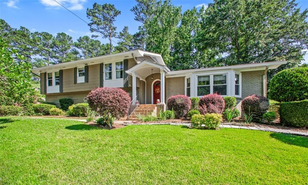 4 bedroom, 3 bathroom single family residence sold at 4365 Huntington Circle, Atlanta, GA 30338