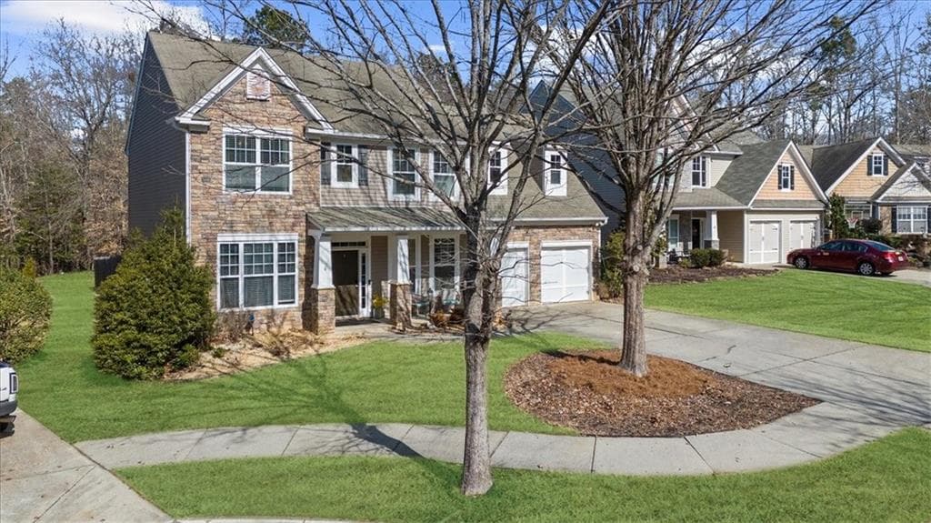 4 bedroom, 3 bathroom single family residence sold at 6909 Island Pointe Drive, Buford, GA 30518